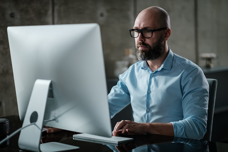 man working on computer